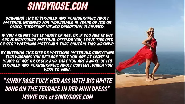 Sindy Rose Se Folla El Culo Con Una Gran Polla Blanca En La Terraza Con Un Mini Vestido Rojo