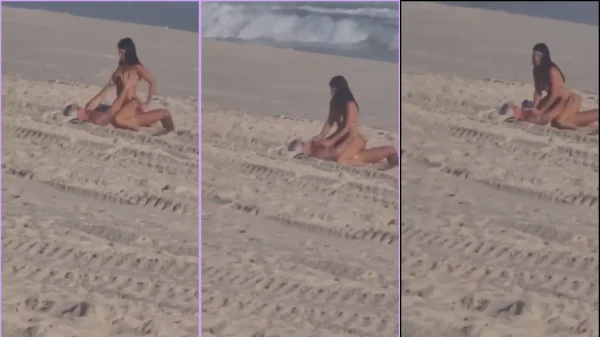Aficionado A Una Morena Divirtiéndose Con Una Corona Junto A La Playa
